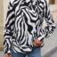 مميزة Zebra بلوزة